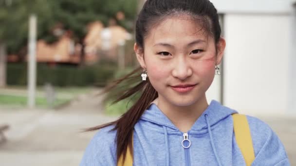 Chinese Female Teenager Student Smiling Looking Camera Portrait Asian Young — Video