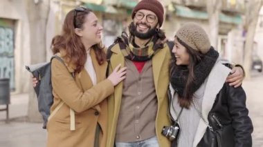 Group of young friends on winter vacation having good times together 