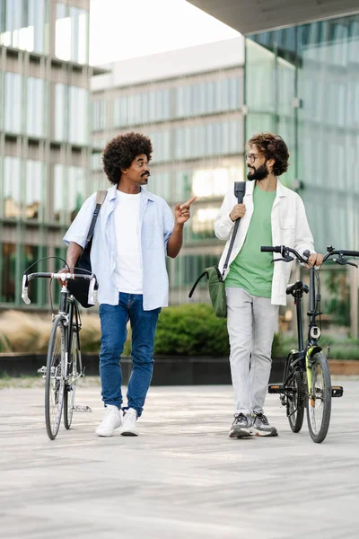 Two Young Male Friends Bicycle Modern Coworkers Walking Office – stockfoto