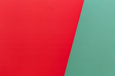 Red and green paper texture for interesting and modern background. Great for your design and wallpaper. Christmas background