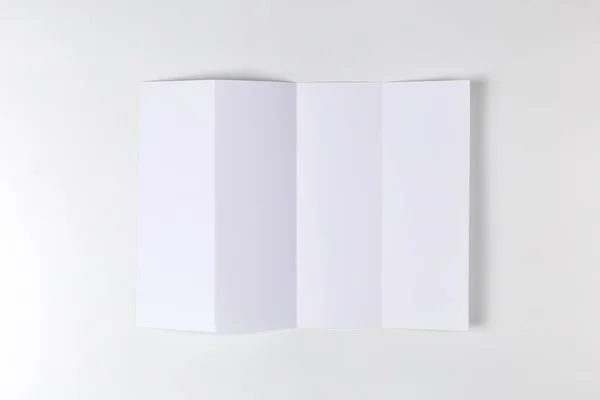 Empty Sheet Paper Folded Four Times White Background Top View — Stock Photo, Image
