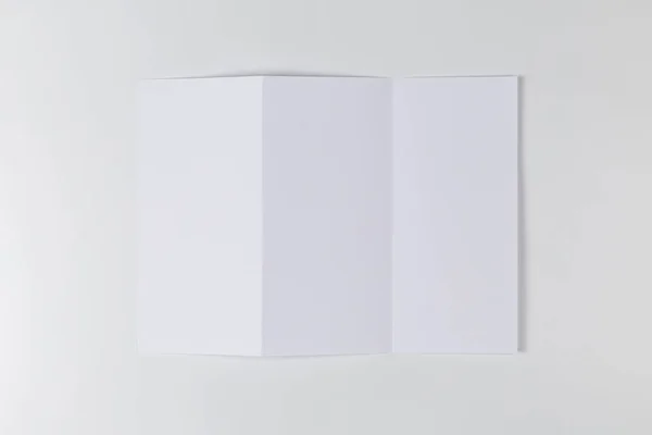 Empty Sheet Paper Folded Three Times White Background Top View — Stock Photo, Image