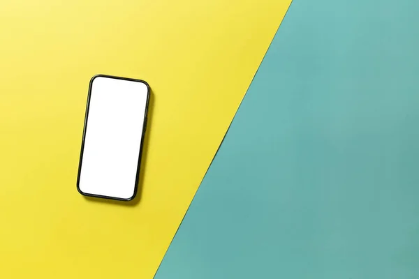 Mobiele Telefoon Smartphone Met Blanco Scherm Gele Groene Achtergrond Bovenaanzicht — Stockfoto