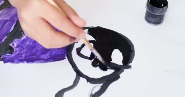 Child Paints Interesting Picture Black Paint Paintbrush Kid Puts Effort — Stock Video