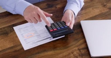 Businessman has problems with counting communal payments bills and struggles with comparing trading market and bills. Flat owner tries to solve problems