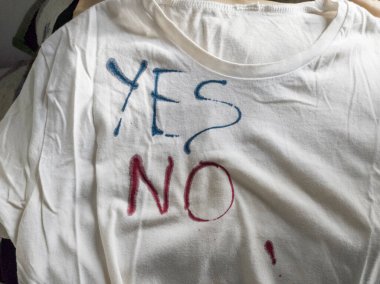 Writing Yes and No on T-Shirt with Ink