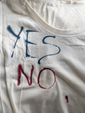 Writing Yes and No on T-Shirt with Ink