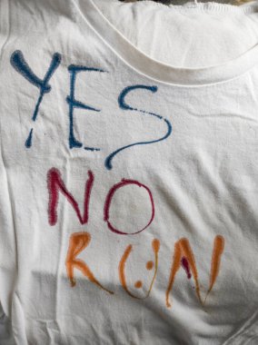 Writing Yes, No and Run on T-Shirt with Ink