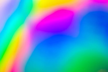 Abstract blur holographic rainbow foil iridescent background