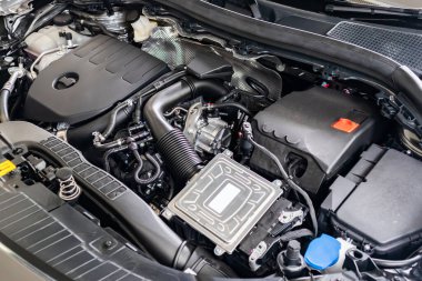 modern car engine under hood close up detail