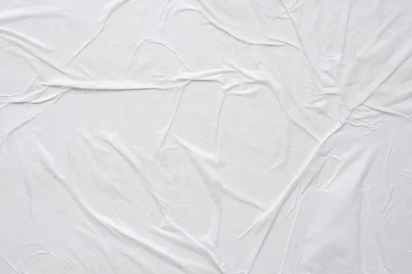 白色折皱和折皱的纸海报纹理背景 — 图库照片