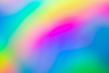 Abstract blur holographic rainbow foil iridescent background