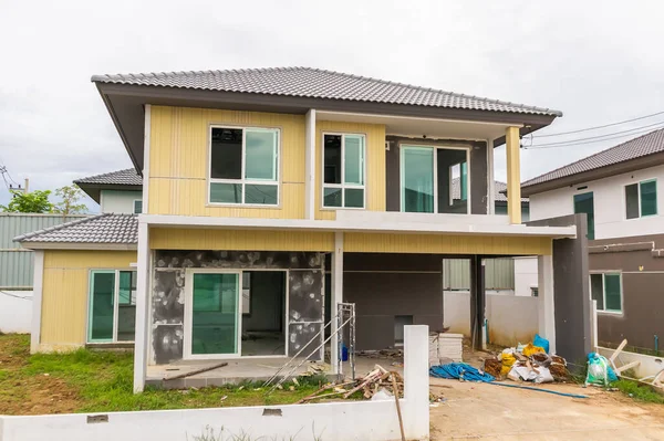 stock image construction residential new house in progress at building site