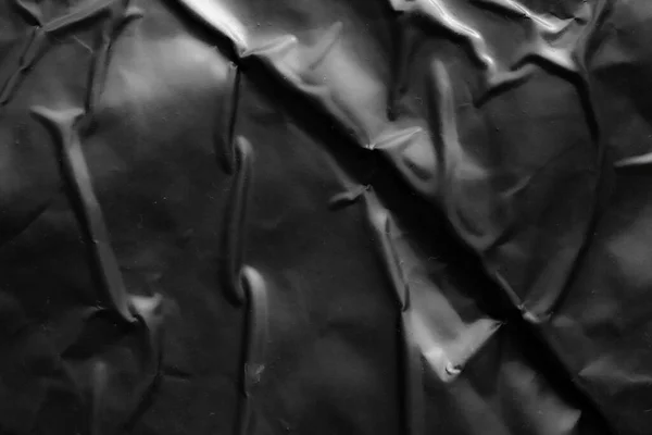 Black Crumpled Creased Plastic Poster Texture Background — Stock fotografie