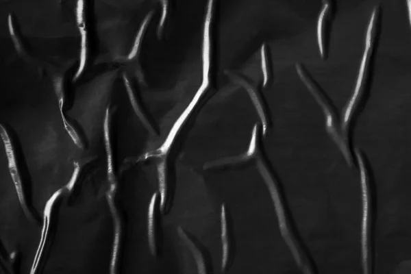 Black Crumpled Creased Plastic Poster Texture Background — Fotografia de Stock