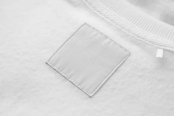 Blank White Laundry Care Clothes Label Fabric Texture Background — Stockfoto
