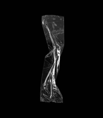 Yapışkan plastik bant siyah arkaplanda izole edildi