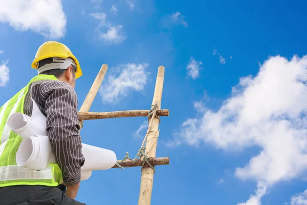 stock image Asian business man engineer climbing up ladder with blue sky, career growth and success concept