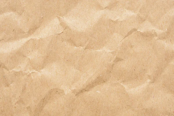 折皱和折皱回收棕色纸的纹理背景 — 图库照片