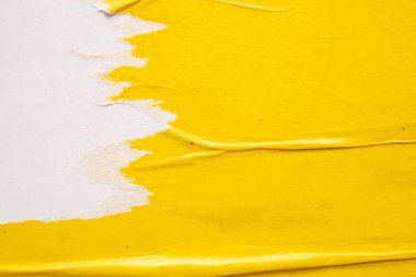 Eski grunge yırtık sarı kağıt poster yüzey dokusu arka planı