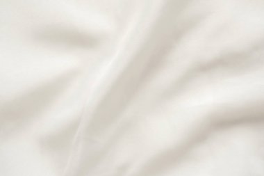 Yumuşak dalga arkaplanı olan soyut beyaz kumaş dokusu