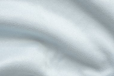 Yumuşak dalga arkaplanlı soyut mavi kumaş dokusu