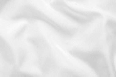 Yumuşak dalga dokusu arka planına sahip soyut beyaz kumaş