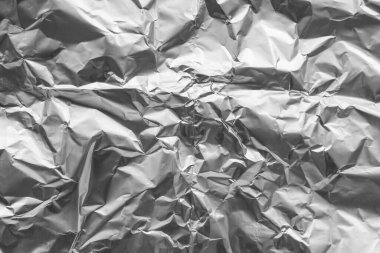 Parlak metal gri folyo buruşuk doku arka planı