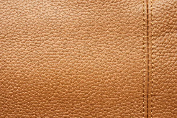 ステッチが施された贅沢な茶色の革の質の背景 — ストック写真