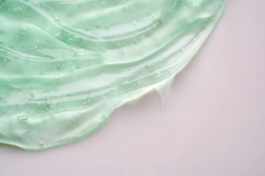 Şeffaf yeşil sıvı serum jel kozmetik doku arkaplanı