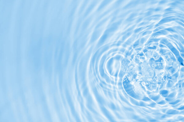 Abstract transparent water shadow surface texture natural ripple on blue background