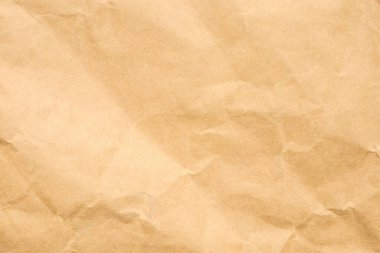 Soyut buruşmuş ve buruşmuş geri dönüşüm kahverengi kağıt dokusu arka planı