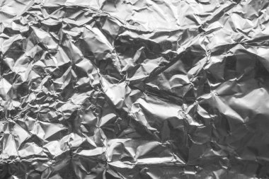 Parlak metal gri folyo buruşuk doku arka planı