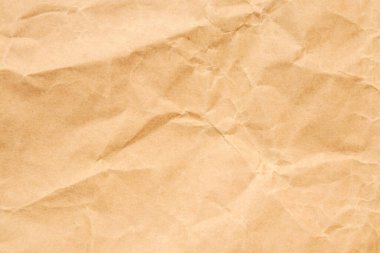 Soyut buruşmuş ve buruşmuş geri dönüşüm kahverengi kağıt dokusu arka planı