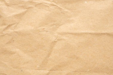 Soyut buruşmuş ve buruşmuş geri dönüşüm kahverengi kağıt dokusu arka planı