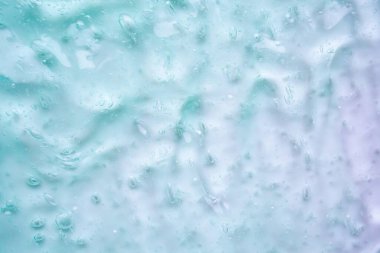 Şeffaf mavi sıvı serum jel kozmetik doku arkaplanı