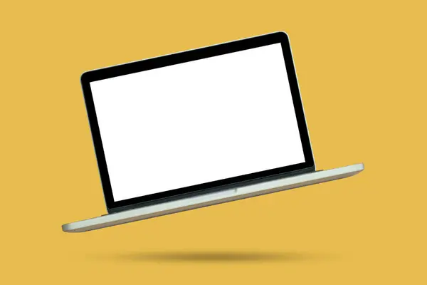 stock image Laptop with blank screen isolated on yellow background