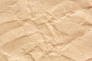 Soyut buruşmuş ve buruşmuş geri dönüşüm kahverengi kağıt dokusu arka planı