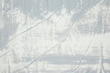 Beyaz buruşmuş ve buruşmuş kağıt poster arka planında gri renk