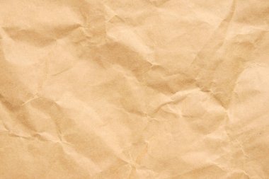 Soyut buruşmuş ve buruşmuş geri dönüşüm kahverengi kağıt dokusu arka planı