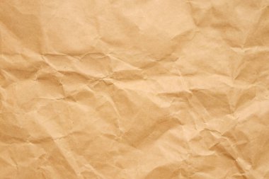 Soyut buruşmuş ve buruşmuş geri dönüşüm kahverengi kağıt dokusu arka planı