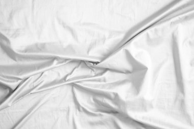 Soyut beyaz kırışık yatak örtüsü kumaş dokusu arka planı