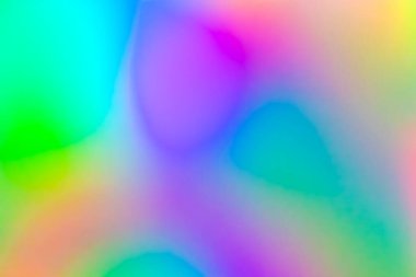 Abstract blur holographic rainbow foil iridescent background