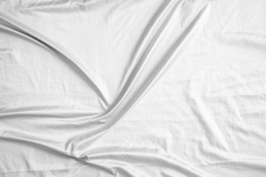 Soyut beyaz kırışık yatak örtüsü kumaş dokusu arka planı