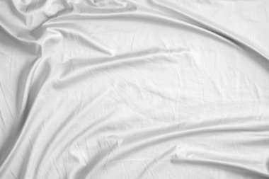 Soyut beyaz kırışık yatak örtüsü kumaş dokusu arka planı