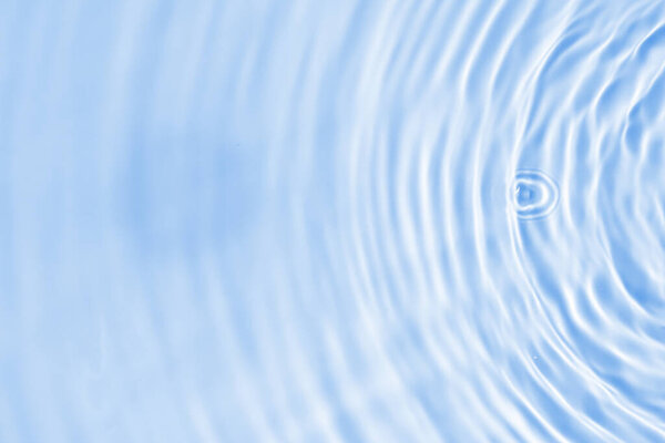 Abstract transparent water shadow surface texture natural ripple on blue background