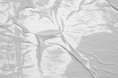 Beyaz buruşmuş ve buruşmuş kağıt poster arka planında gri renk