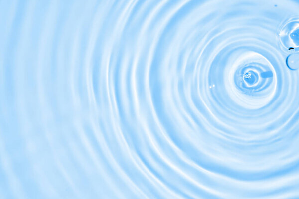 Abstract transparent water shadow surface texture natural ripple on blue background