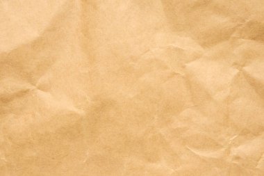 Soyut buruşmuş ve buruşmuş geri dönüşüm kahverengi kağıt dokusu arka planı