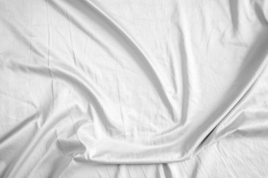 Soyut beyaz kırışık yatak örtüsü kumaş dokusu arka planı